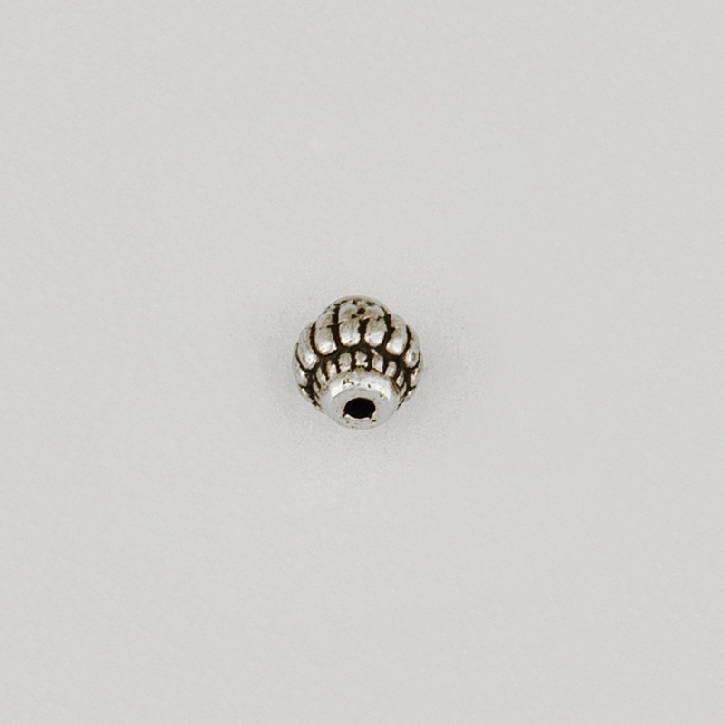 Metal bead 8x7mm. Hole Ø 1,5mm