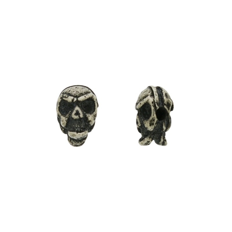 [120530000] Intercalaire crà¢ne 12x9mm. Trou Ø 3mm.