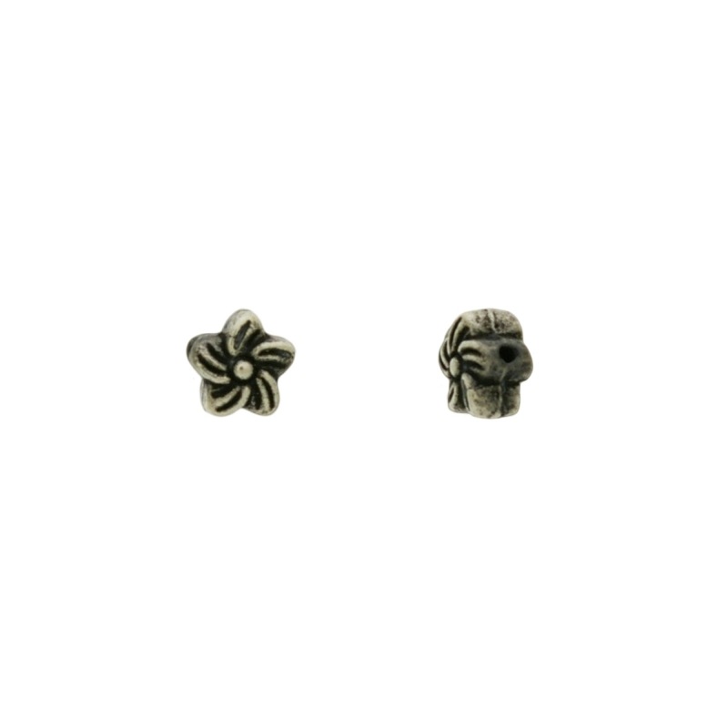 [120720000] Intercalaire étoile Ø 6mm. Trou Ø 1mm.