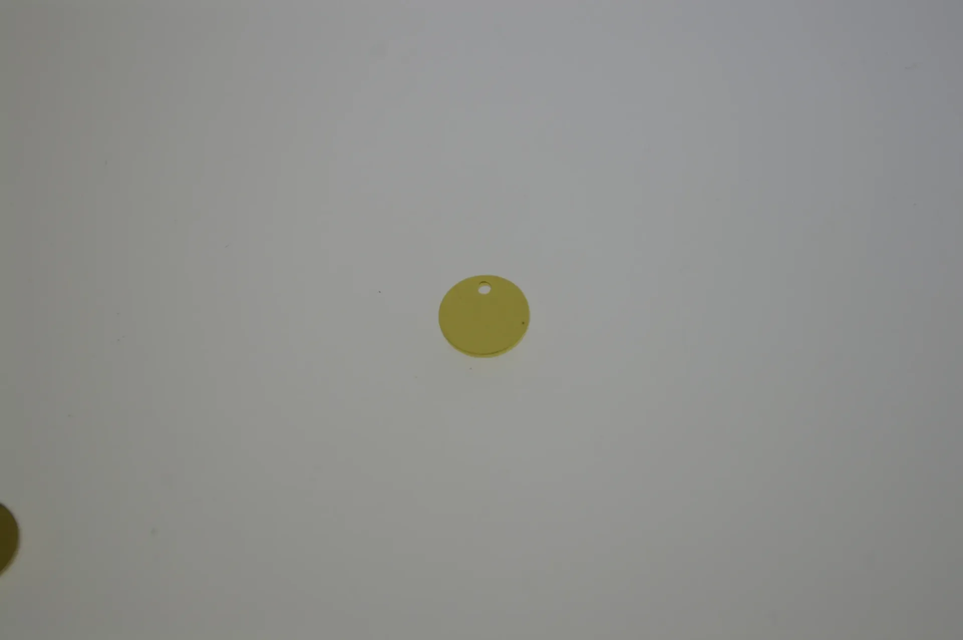 [129570831] Brass disc Ø 8mm with hole. Gold plated.