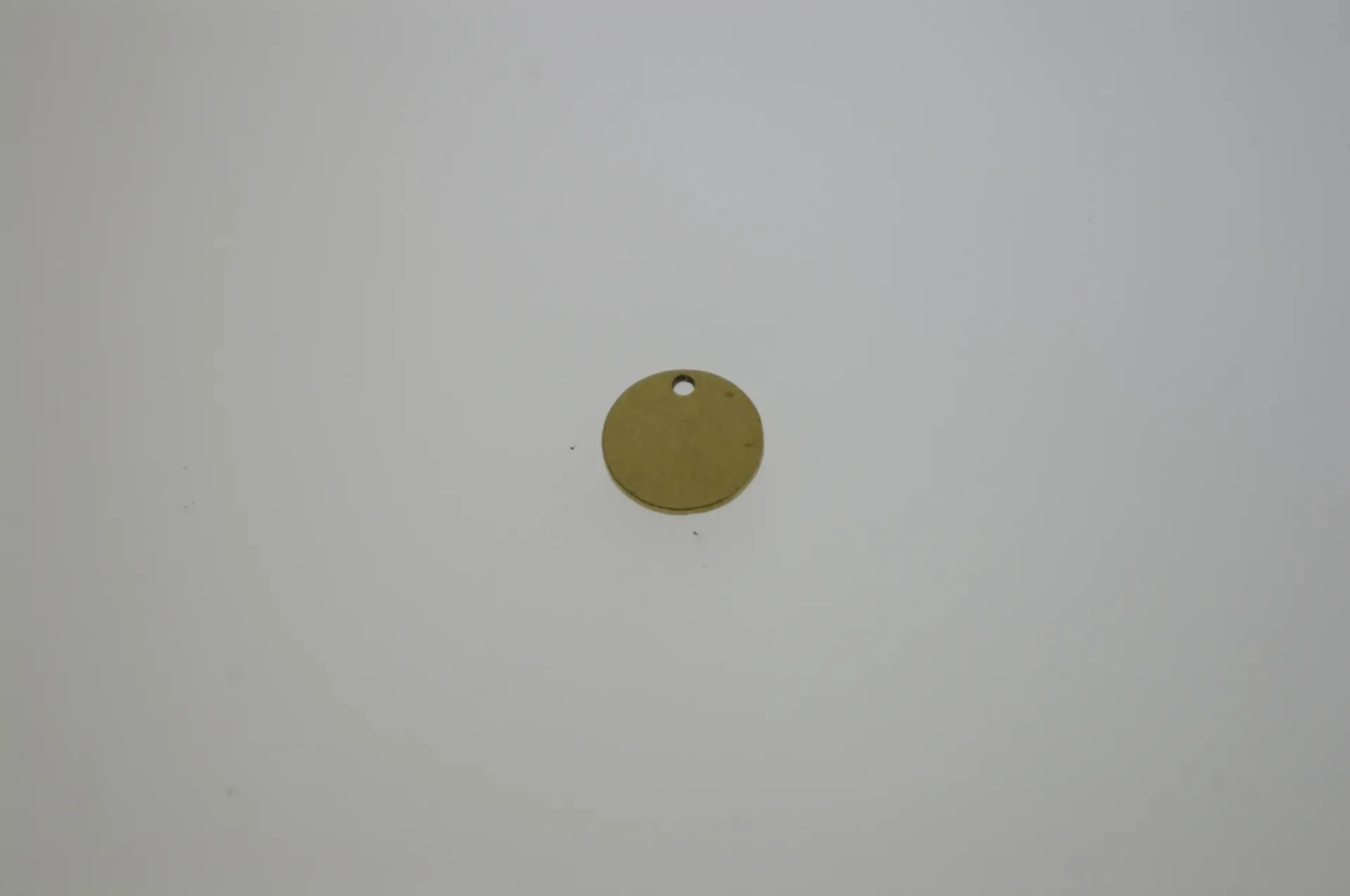 [129571000] Disco de latón Ø 10mm con agujero.