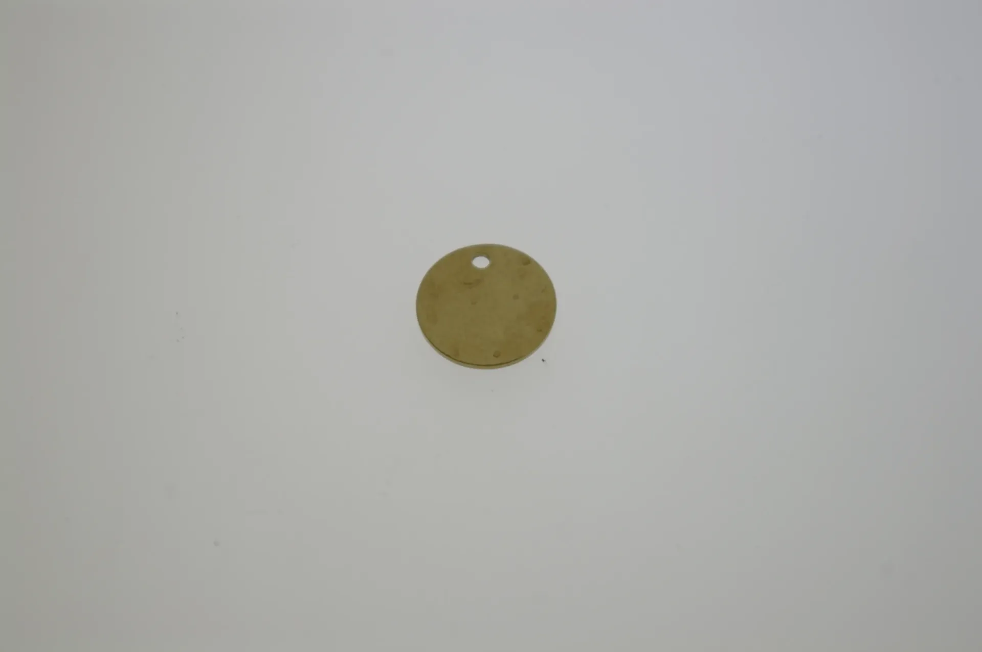 [129571200] Disque en laiton Ø 12mm avec trou